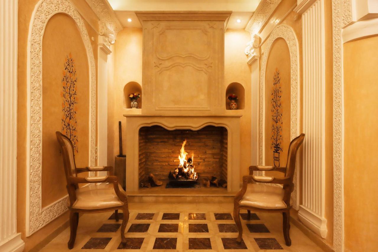 Riad Palais Des Princesses & Spa Marrakesh Esterno foto A fireplace in a home